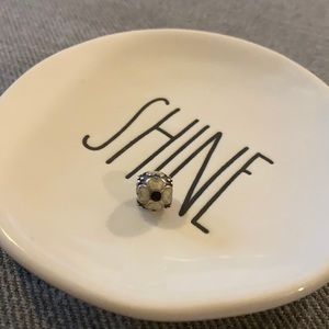 Retired authentic Pandora SS Daisy Enamel White/Black Flower charm. NWOT